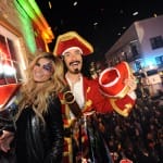 Captain Morgan and his First Mate Supermodel Marisa Miller throw beads from the balcony of Bourbon Street Blues Co. during Mardi Gras in New Orleans, Sunday, March 6, 2011. The pair were in town as part of the Captain’s One Million Poses campaign.