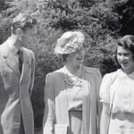 Britain’s Queen Elizabeth (the then Princess Elizabeth) (R), her mother Queen Elizabeth (C) and father King George VI, from archive film footage. The film, entitled Royal Road, was shot during a car trip around the grounds of Windsor Castle in 1941.