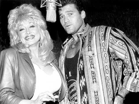 Dolly Parton passes Billy Ray Cyrus